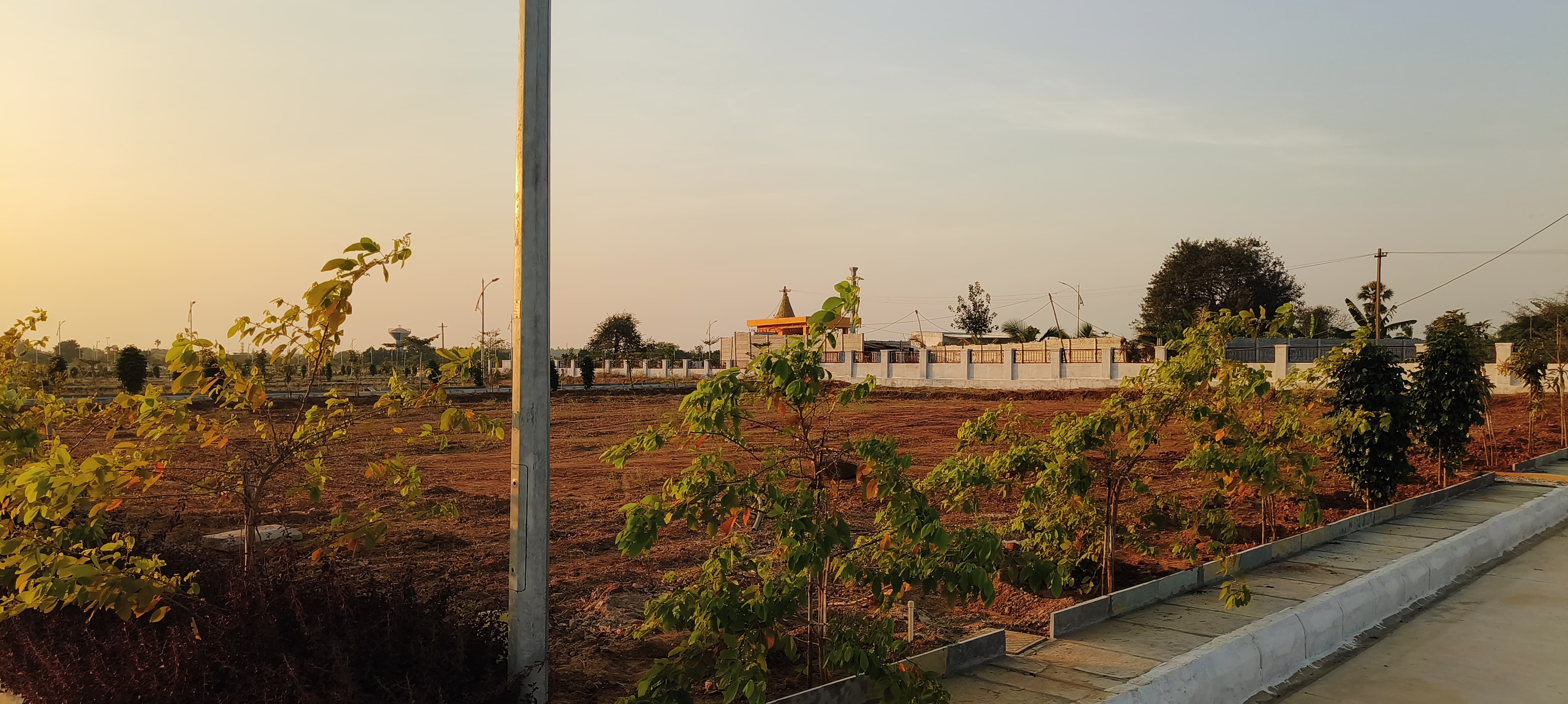 HMDA GATED RESIDENTIAL OPEN PLOTS With Clubhouse & Swimming pool @GOLLUR, Near Shamshabad